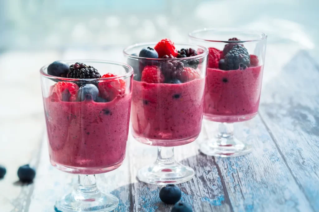 The Probiotic Berry Smoothie is separately in 3 glasses.