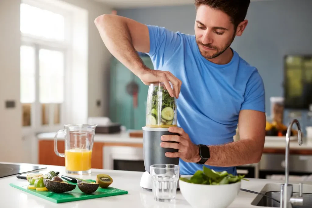 Man grinding fresh juice. 